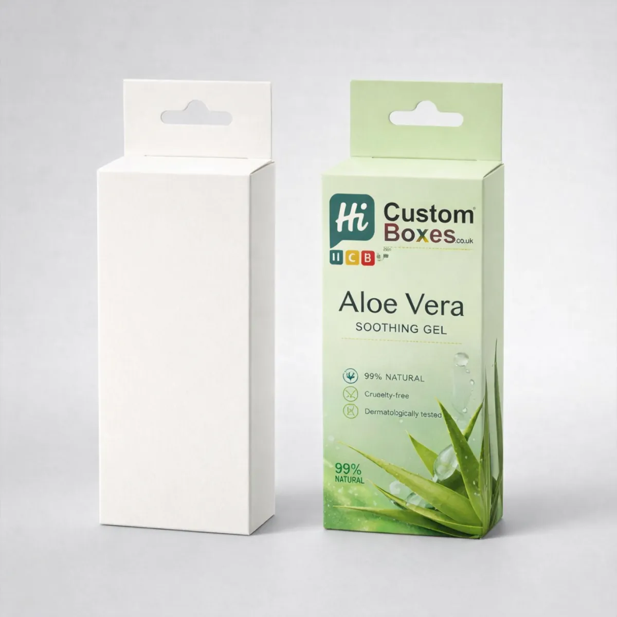 Two vertical retail boxes with hanging tabs: one blank white and one featuring aloe vera branding. class=